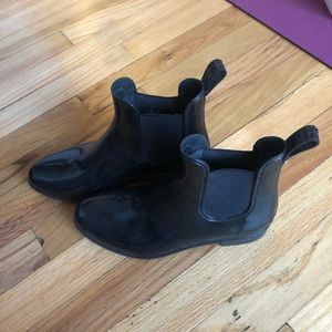 Black rain boots.